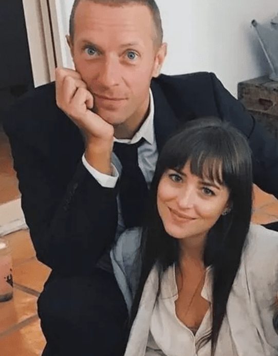 Дакота Джонсон и Крис Мартин